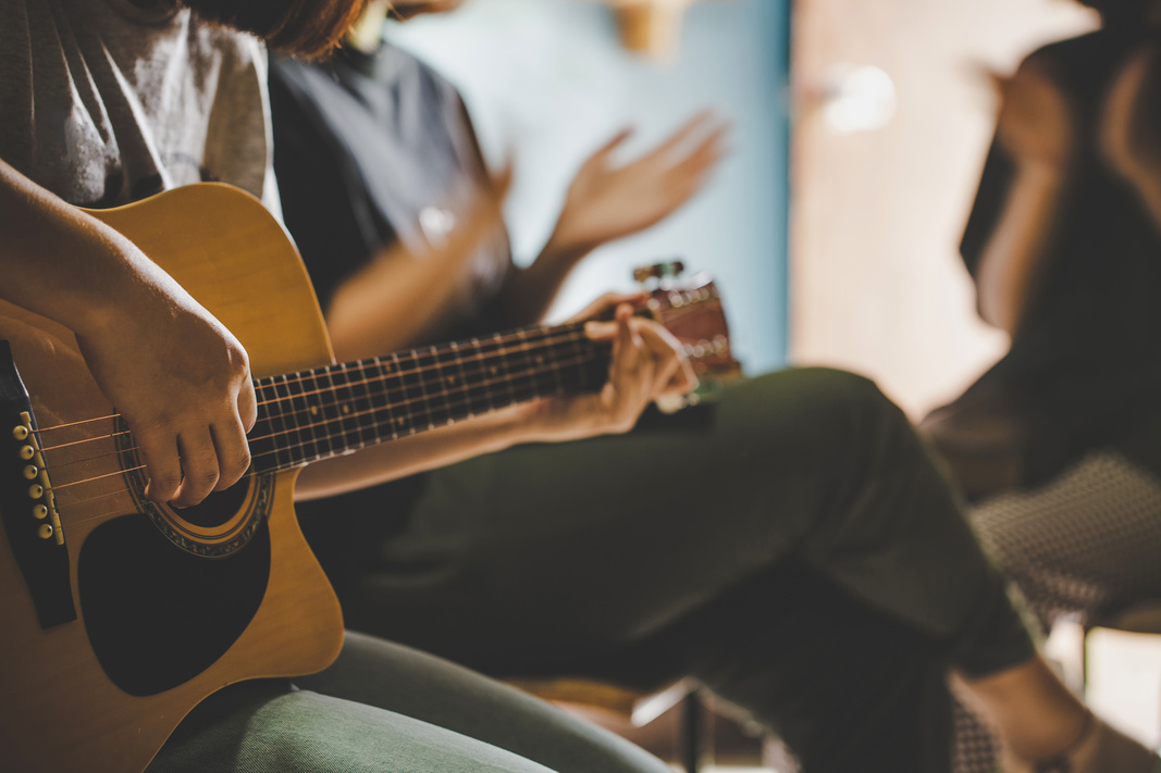 People Singing and Playing Worship Songs